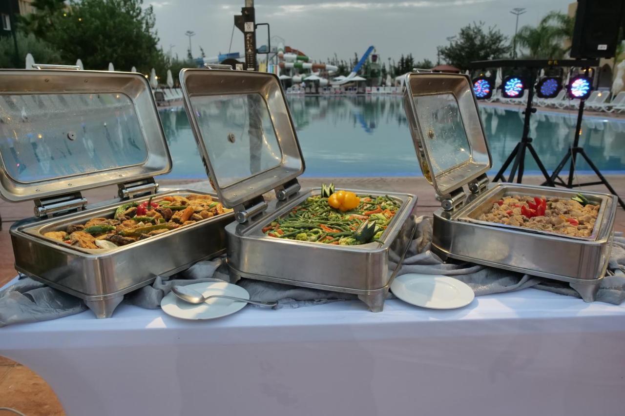 El Olivar Palace Marrakech El Harkat 외부 사진 A chafing dish buffet