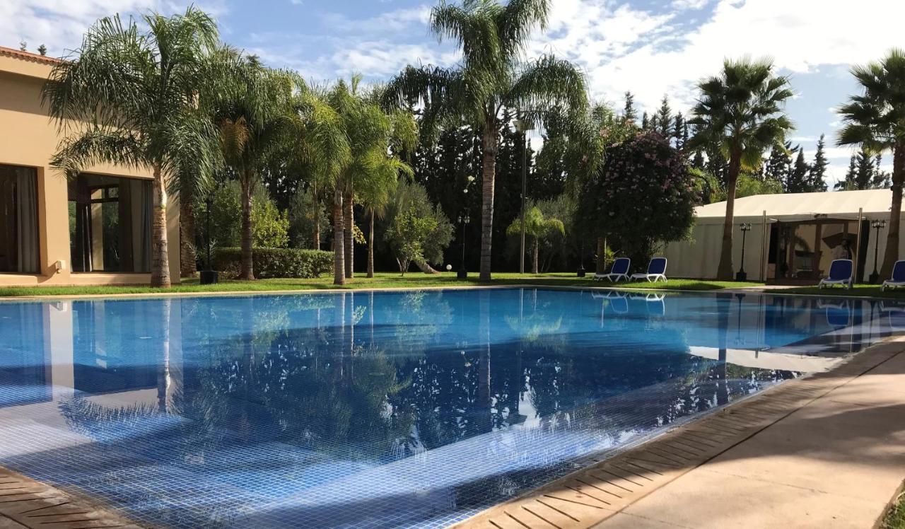 El Olivar Palace Marrakech El Harkat 외부 사진 The pool at the Royal Palm Hotel