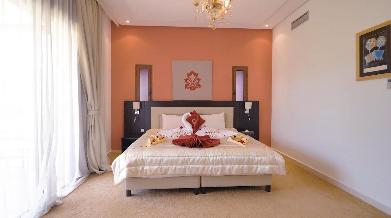 El Olivar Palace Marrakech El Harkat 외부 사진 A bedroom at the hotel